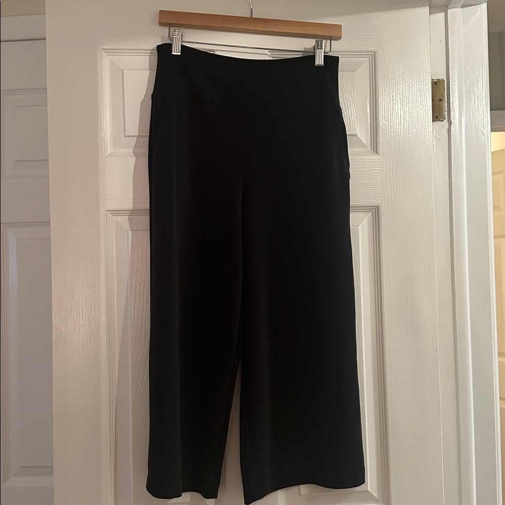 Athleta Sea Side Black Wide Leg Pants with side pockets.